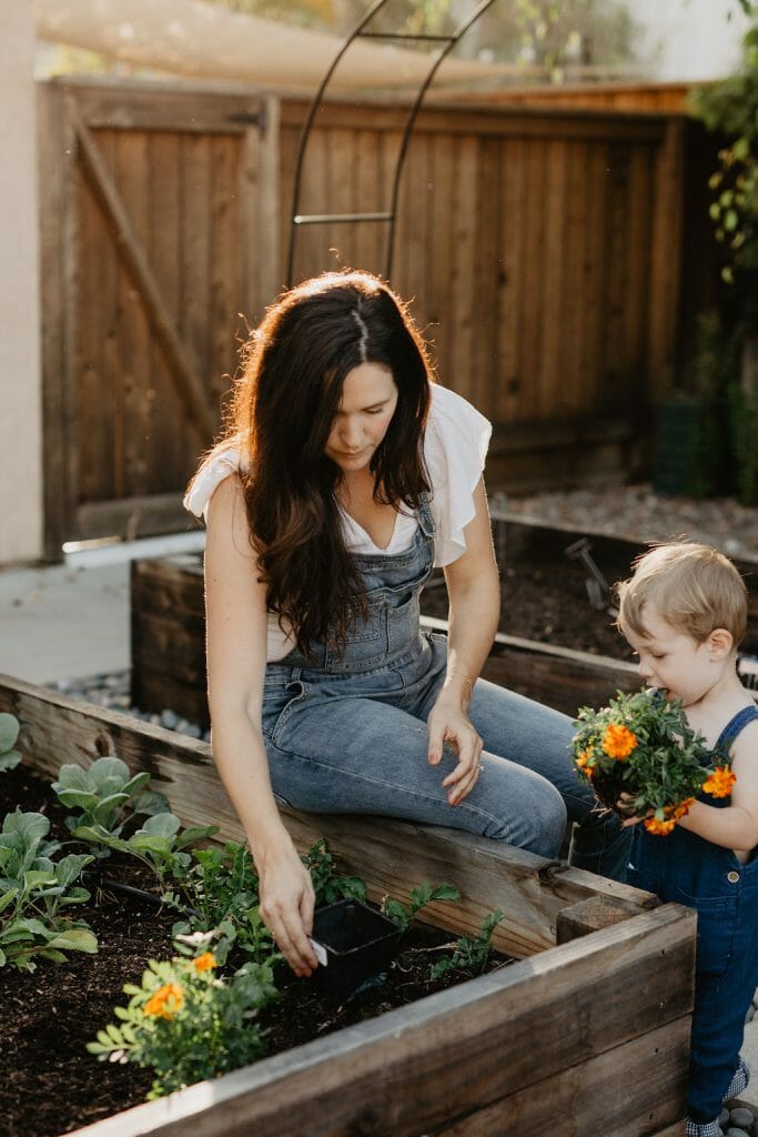 woman gardening with her son